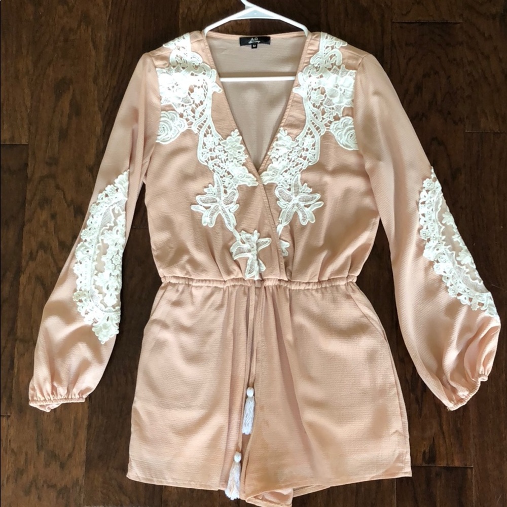Tan and Lace long sleeve romper. Worn once